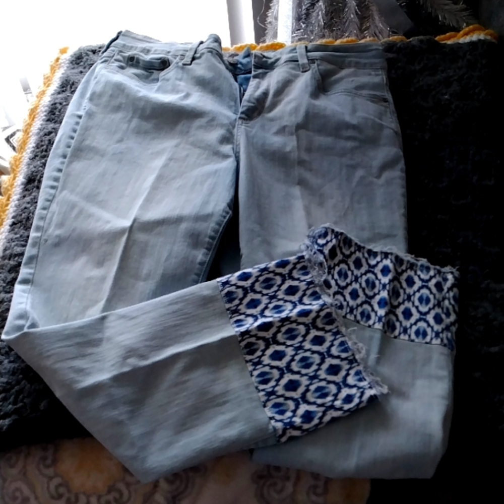 Light blue jeans w/trim on the bottom